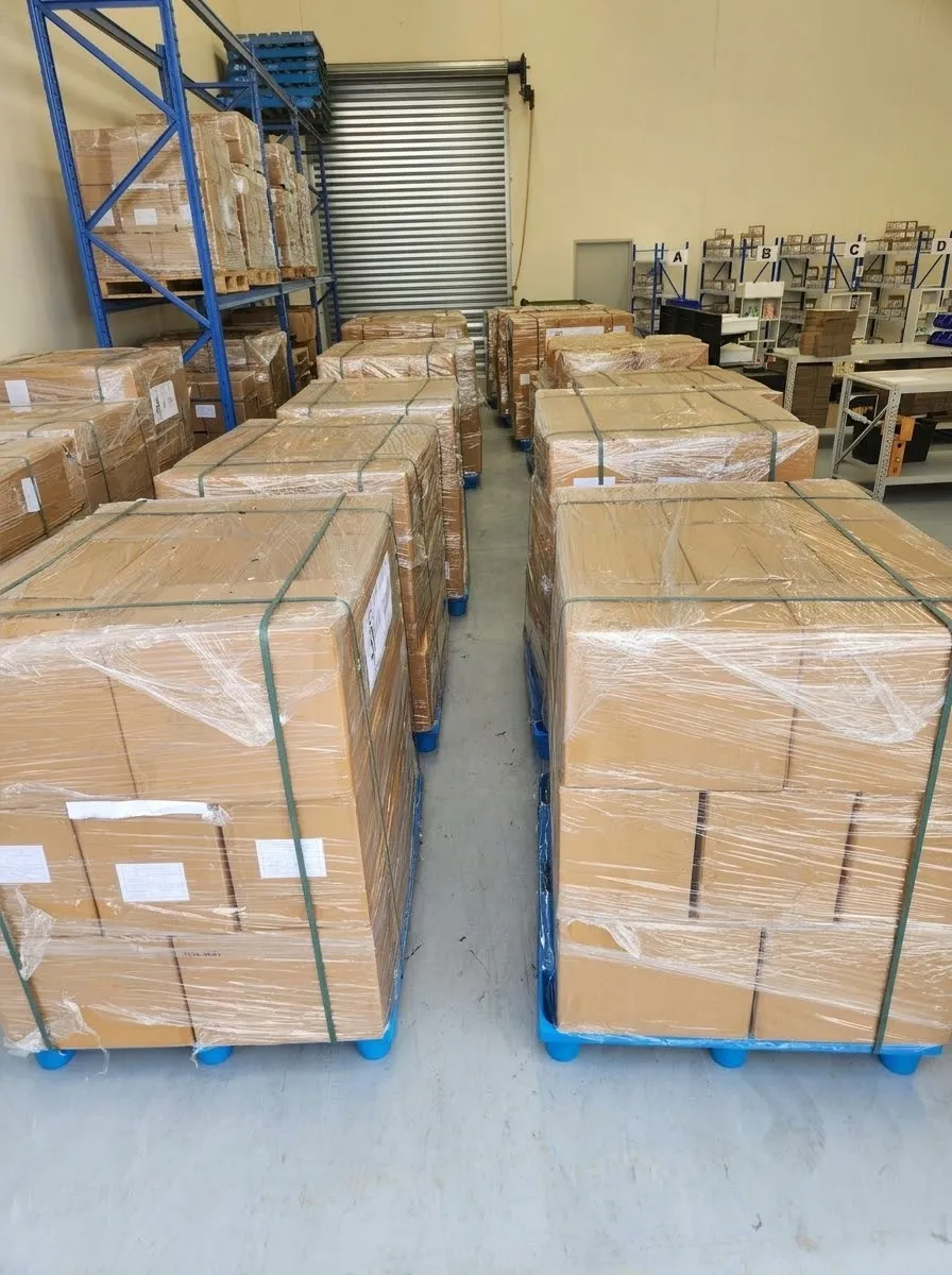 Pallets of boxed stock lined up in the Pantry to Plate Co. despatch warehouse, ready to ship.